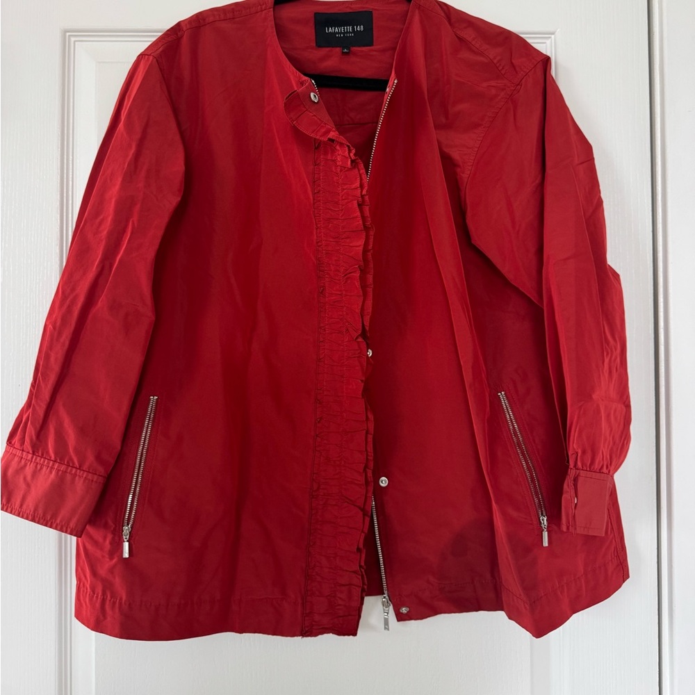 Cute red windbreaker with frills in front